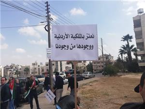 Royal Wings Company employees deliver a protest note to Al-Razzaz